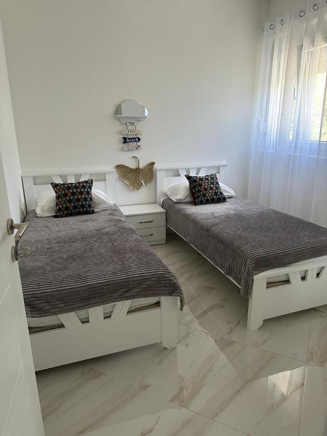 Villa Holiday Apartments Bar Bagian luar foto